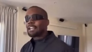 Kanye Accuses Playboi Carti of Showing Up to His Hotel Strapped