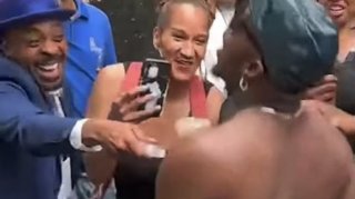 Diddy Supporters Spray Baby Oil on One Another While Celebrating Verdict in Federal Trial